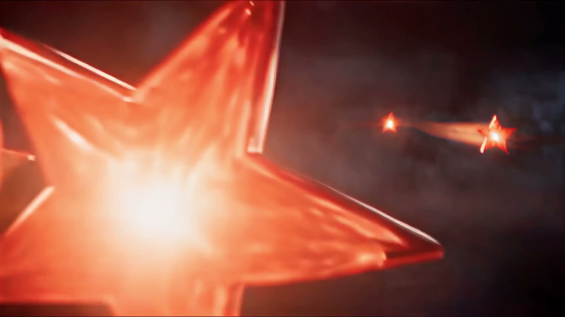 Una estrella roja en primer plano atravesando el humo
